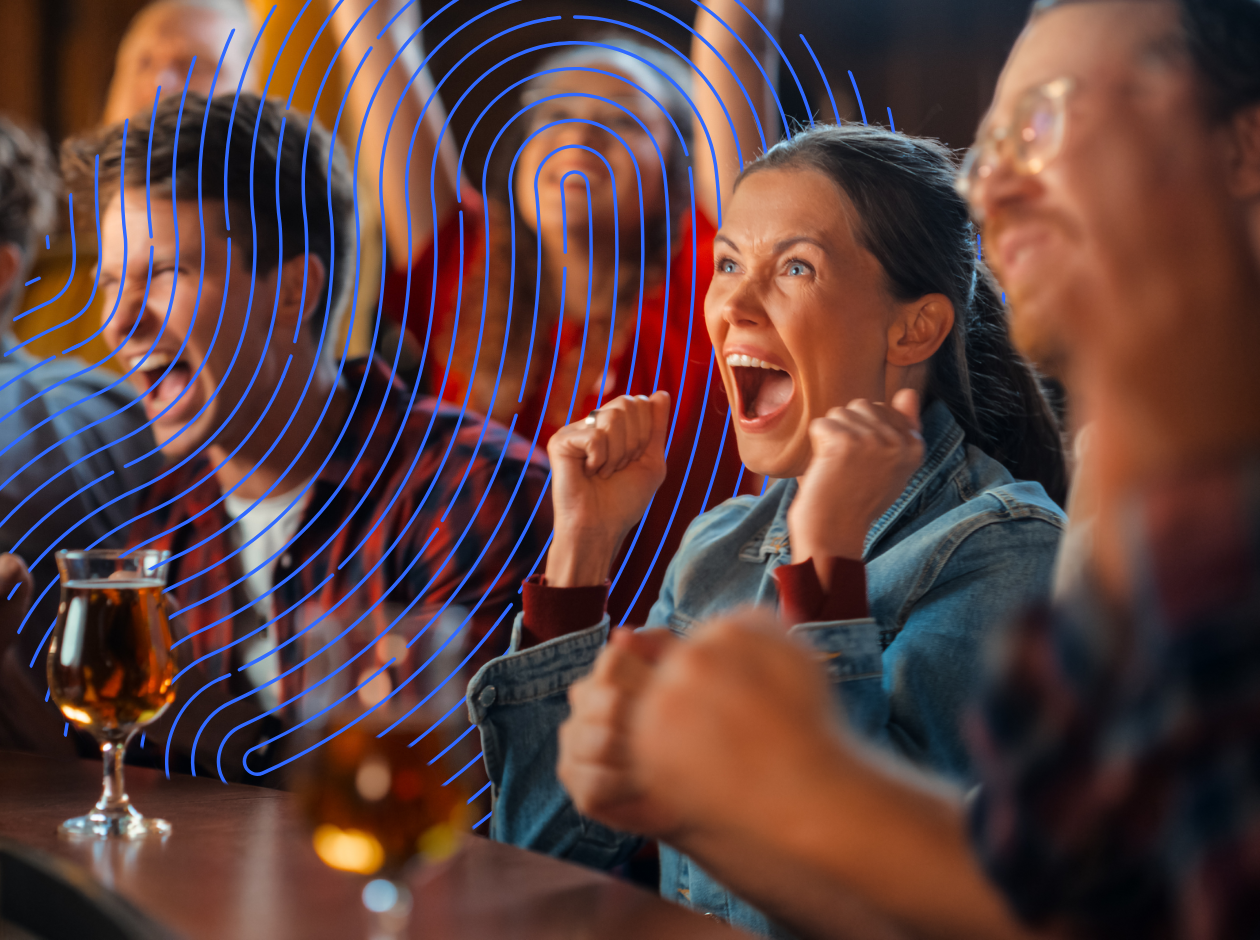 People cheering in pub